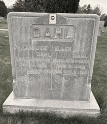 A tombstone in a cemetery AI-generated content may be incorrect.